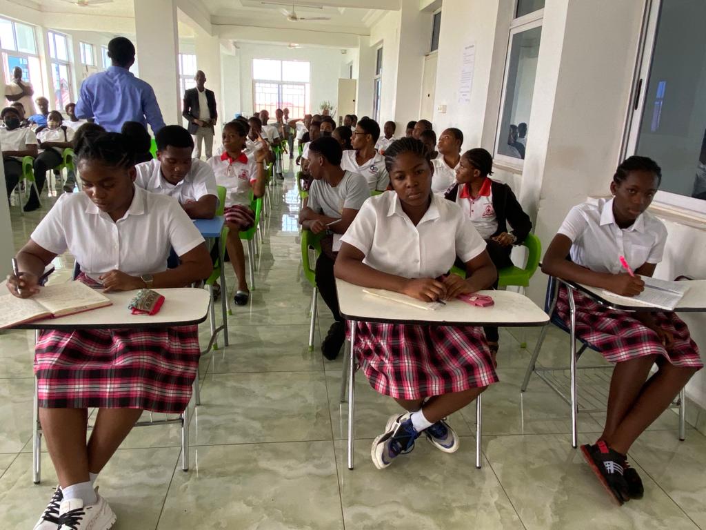 Students learning and reflecting in class